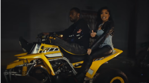 Lola Brooke on motorcycle