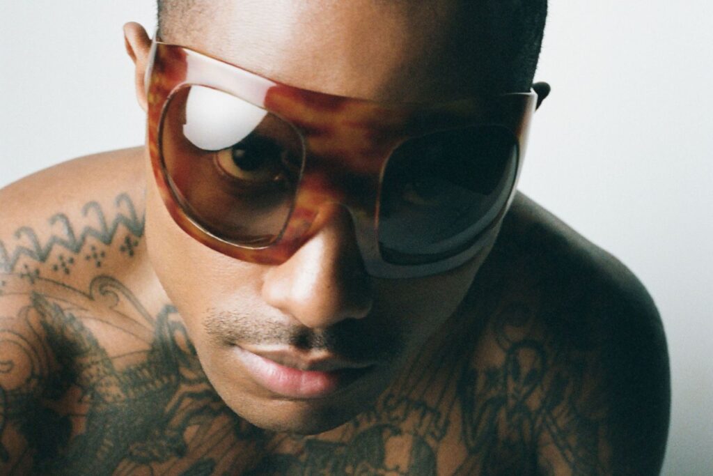 A photo of Steve Lacy wearing sunglasses photographed by Gus Van Sant
