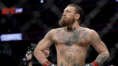 Conor McGregor & Dustin Poirier Come Face-To-Face Before Rematch