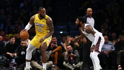 LeBron James & Kyrie Irving Spark Beef Rumors During Matchup