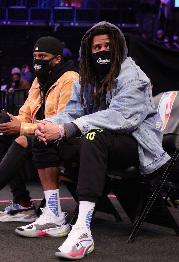 J. Cole Wears RS-Dreamer to Nets-Hornets Game