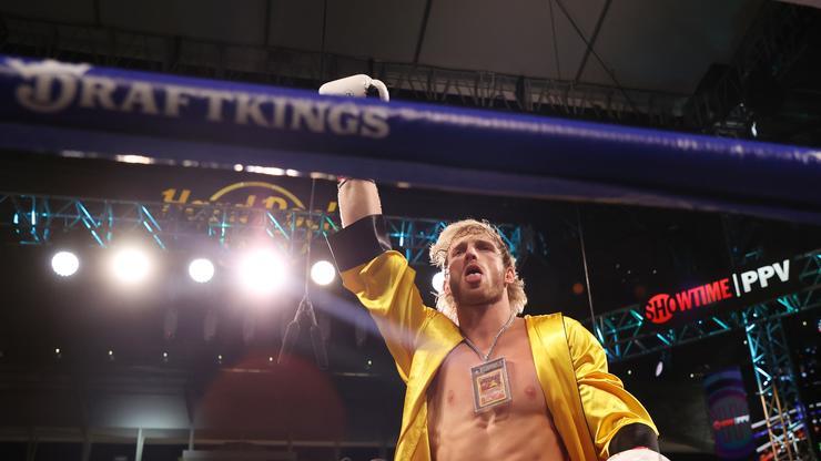 Logan Paul Stuns Fans With Charizard Pokemon Card Chain