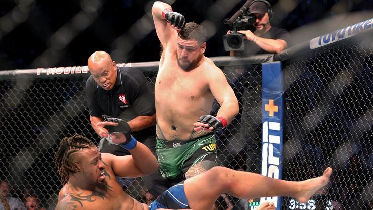 Tai Tuivasa Pulls A Stone Cold Shoey With Nikes While Celebrating Greg Hardy KO At UFC 264