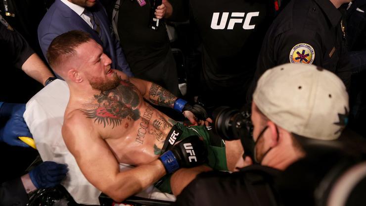 Conor McGregor Taken Off On Stretcher After Gruesome Leg Injury