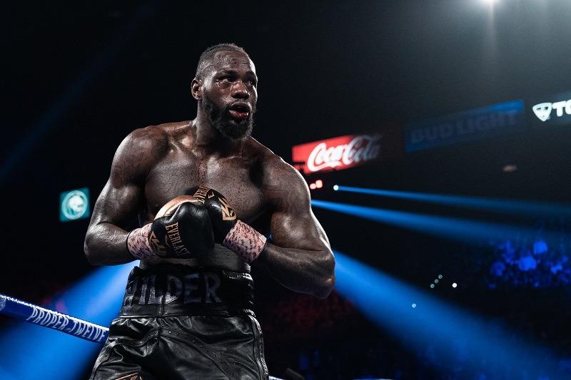 SOURCE SPORTS: Deontay Wilder’s Fiancée Says Fury’s COVID Case Was An Effort to Buy Time