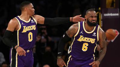 LeBron James & Aaron Donald Hug It Out After LeBron Puts Up Huge Numbers