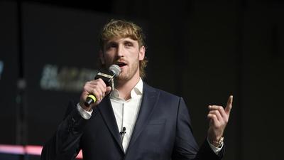 Logan Paul Flexes $5 million Pokemon Card At WrestleMania