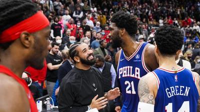 Drake & Joel Embiid Get Into Hilarious War Of Words At Raptors Game