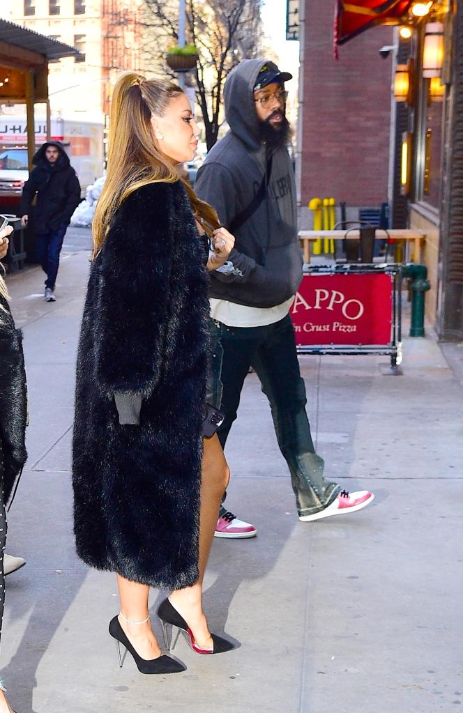 Marcus Jordan & Larsa Pippen Seal Secret Handshake With A Kiss