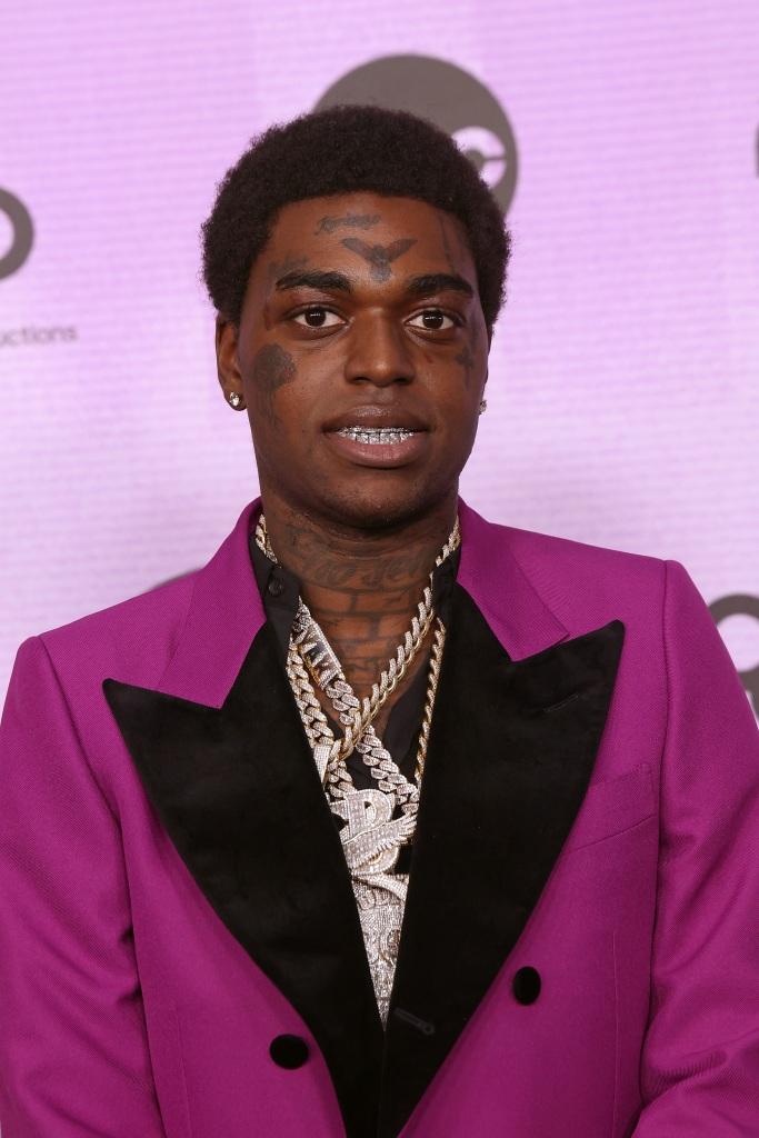 Kodak Black Receives Custom “Sniper Gang” Sneakers